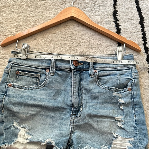 AE Light Wash Distressed High Rise Shortie Eyelet Pockets Denim Shorts - Picture 5 of 9